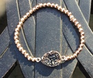 Rose gold plated with black resin stone - Image 1