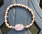 Rose gold plated with pink resin stone